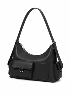 Detailed view of black leather shoulder bag with multiple pockets and silver hardware accents.