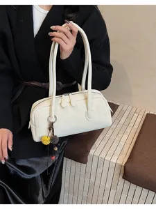 White baguette shoulder bag for women, trendy French retro design handbag with cute pendant.