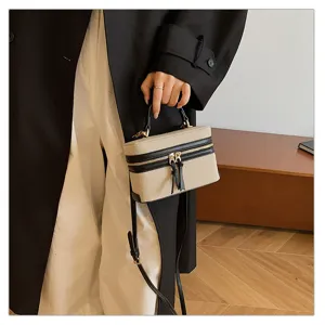 Chic color contrast box bag, vintage canvas and leather handbag with top handle and strap.