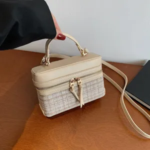 Chic beige tweed box handbag with top handle and shoulder strap for women daily wear.