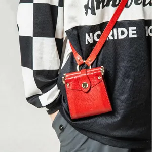 Red PU leather mini crossbody bag, cute dual-use small earphone storage pouch with thin strap.