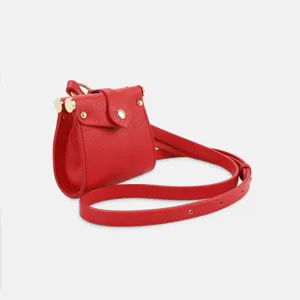 Red PU leather mini crossbody bag, cute earphone storage pouch with gold hardware.