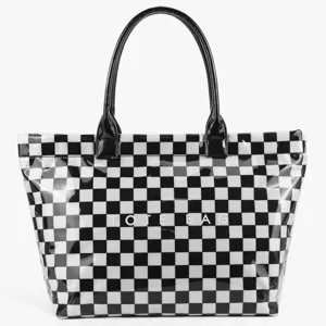 Detailed view of the black and white checkerboard clear PVC tote bag with stylish handles.