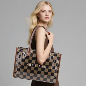 Detail view of the black brown checkerboard PVC tote bag showing dual handles and spacious interior.