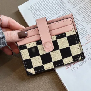 Compact checkered card holder wallet for women, stylish canvas and PU leather card case.