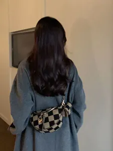 Checkerboard canvas chest bag detail, trendy crossbody sling bag with mini pouch for daily.
