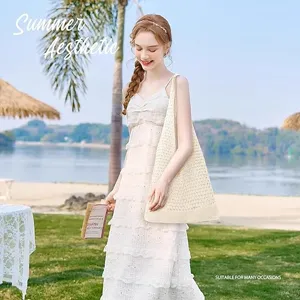 Beige knit crochet tote bag for women, stylish summer beach vacation shoulder bag accessory.