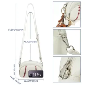White leather vintage baseball crossbody bag with red stitching and adjustable shoulder strap.