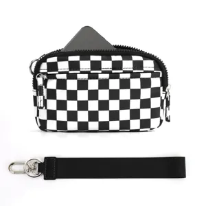 Black and white checkerboard nylon pouch detail, zipper closure with wrist strap.