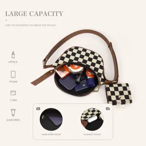 Black and white checkerboard crossbody bag with brown strap and pouch, large capacity.