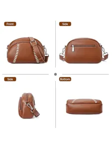 Brown leather vintage baseball crossbody bag with zipper and adjustable shoulder strap style.