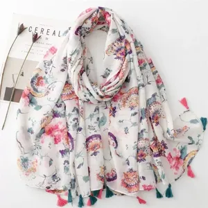 Detail view of cotton linen bohemian floral print tassel scarf, lightweight summer shawl.
