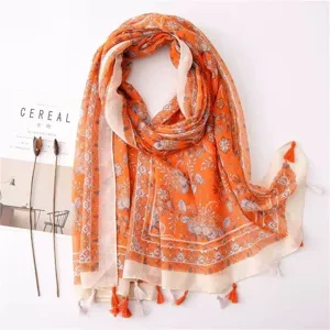 Vintage ethnic floral print cotton linen scarf shawl with elegant tassels in vibrant orange.