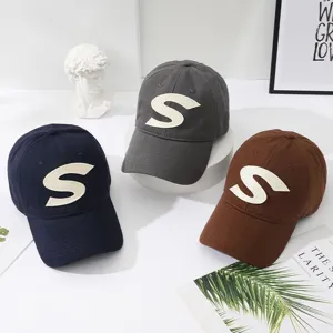 Classic cotton baseball cap with bold letter S patch, stylish casual sun hat for men and women.