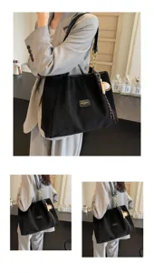 Black frosted large capacity tote bag casual shoulder bag for women commuting and daily use.