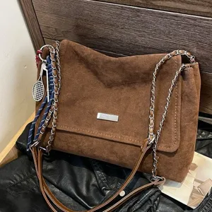 Vintage brown suede shoulder bag for women, large capacity crossbody bag with chain strap.