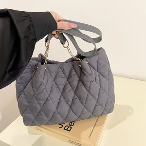 Fashionable quilted tote bag for women, large capacity shoulder bag with chain strap.