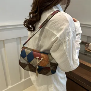 Colorful geometric patchwork shoulder bag with metal V clasp stylish women crossbody bag.
