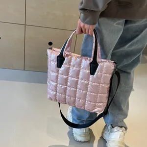 Stylish pink quilted tote bag for women, large capacity shoulder and crossbody handbag.