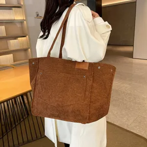 Stylish brown corduroy tote bag for women, large capacity shoulder handbag for daily use.