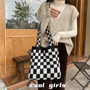 Black and white checkerboard knit tote bag for women, large capacity casual shoulder bag.