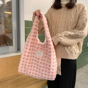 Pink waffle fleece tote bag, soft plush shoulder handbag for daily commuting and student use.