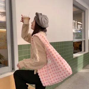 Pink checkered waffle velvet tote bag detail view, soft cozy fabric and large capacity design.