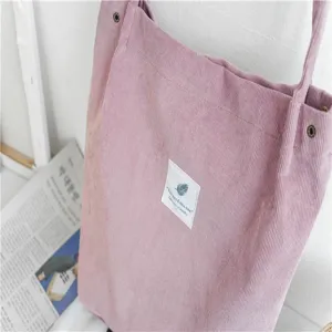 Pink corduroy tote bag for women, large capacity casual single shoulder shopping bag daily use.