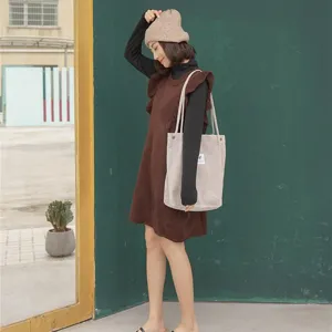 Corduroy shoulder bag featuring large capacity and casual style, perfect for daily use.