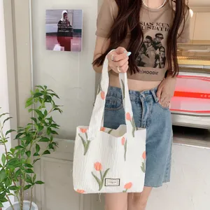 White pleated tote bag with embroidered tulips, casual large capacity shoulder bag for daily use.