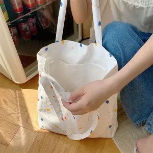 Borsa shopper di tela con motivo a pois colorati, grande borsa a spalla casual per uso quotidiano.