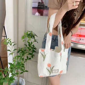 Womens white tulip embroidered canvas tote bag, casual daily shoulder shopping bag detail view.