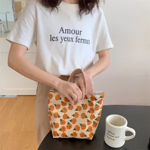 Corduroy lunch tote bag with cute daisy floral print, casual small handbag for daily use.