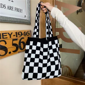 Black and white checkered knitted tote bag for women, casual large capacity shoulder handbag.