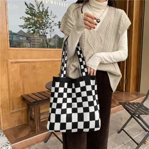 Stylish black and white checkerboard knitted tote bag for women, casual autumn winter handbag.