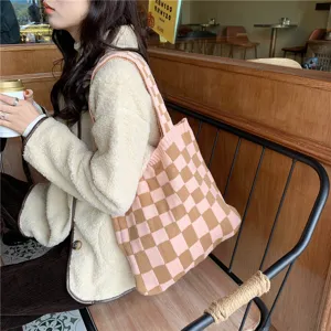 Detailed view of women's autumn winter knit checkered tote bag casual large capacity.