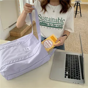 Sac cabas en toile unie vue de détail, style minimaliste décontracté pour un usage quotidien.