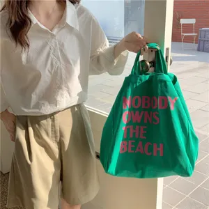 Korean style canvas tote bag with letter print, large capacity casual shoulder bag for women.