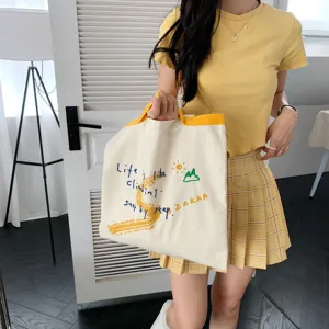 Canvas tote bag with inspirational print, casual shoulder bag for women, daily shopping handbag.