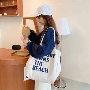 Korean style minimalist canvas tote bag with letter print, large capacity shoulder bag for women.