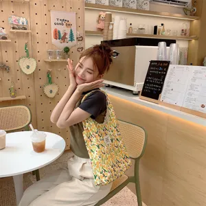 Cute floral canvas tote bag for women and students, perfect for daily casual use.