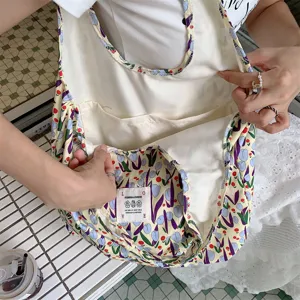 Cute floral canvas tote bag with inner pockets, casual shoulder handbag for daily use.