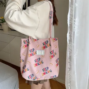 Pink corduroy tote bag large capacity shoulder bag casual shopping bag for daily use.