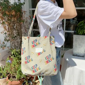 Corduroy tote bag for women, large capacity shoulder bag with colorful prints.