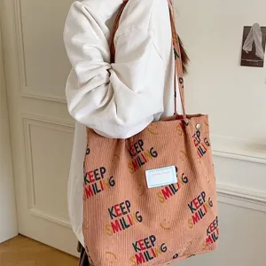 Corduroy tote bag for women, large capacity shoulder bag for commuting, casual shopping handbag.