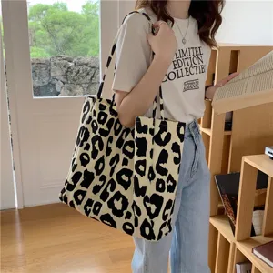Leopard print canvas tote bag, large capacity animal pattern shoulder bag for women daily.
