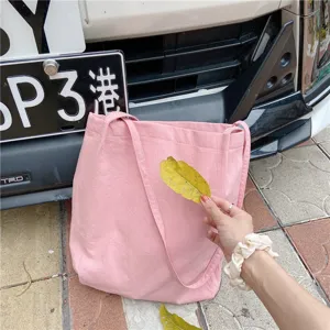 Pink washed linen canvas tote bag with slim straps, casual minimalist style handbag for women.