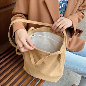 Detailed view of the khaki cotton linen tote bag showing inner lining and pocket structure.