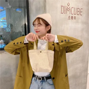 Casual corduroy mini handbag for women, vintage small tote bento bag everyday use.