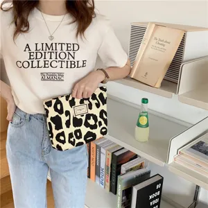 Beige leopard print canvas tote bag, stylish casual handbag and storage pouch for daily use.